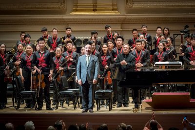 Chinese-American composer Zhou Long, later composer of the Pulitzer Prize-winning opera "Madame White Snake", was born in Beijing.